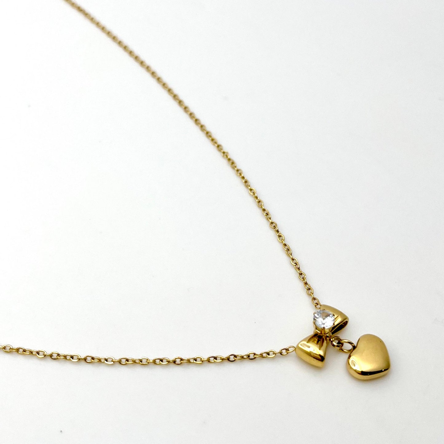 Bow and heart necklace