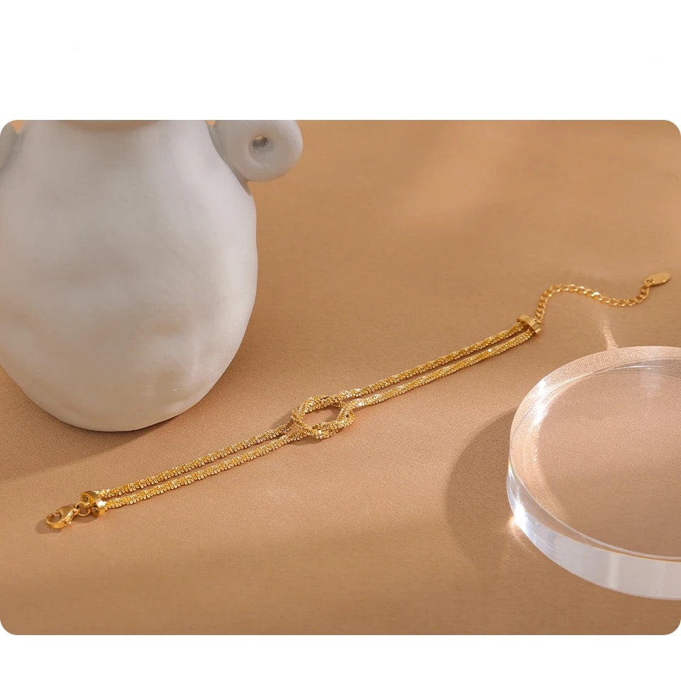 Twisted In Knot Bracelet -18K Gold Coated
