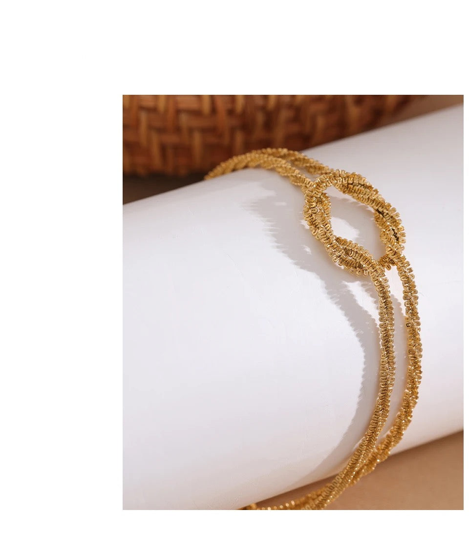 Twisted In Knot Bracelet -18K Gold Coated