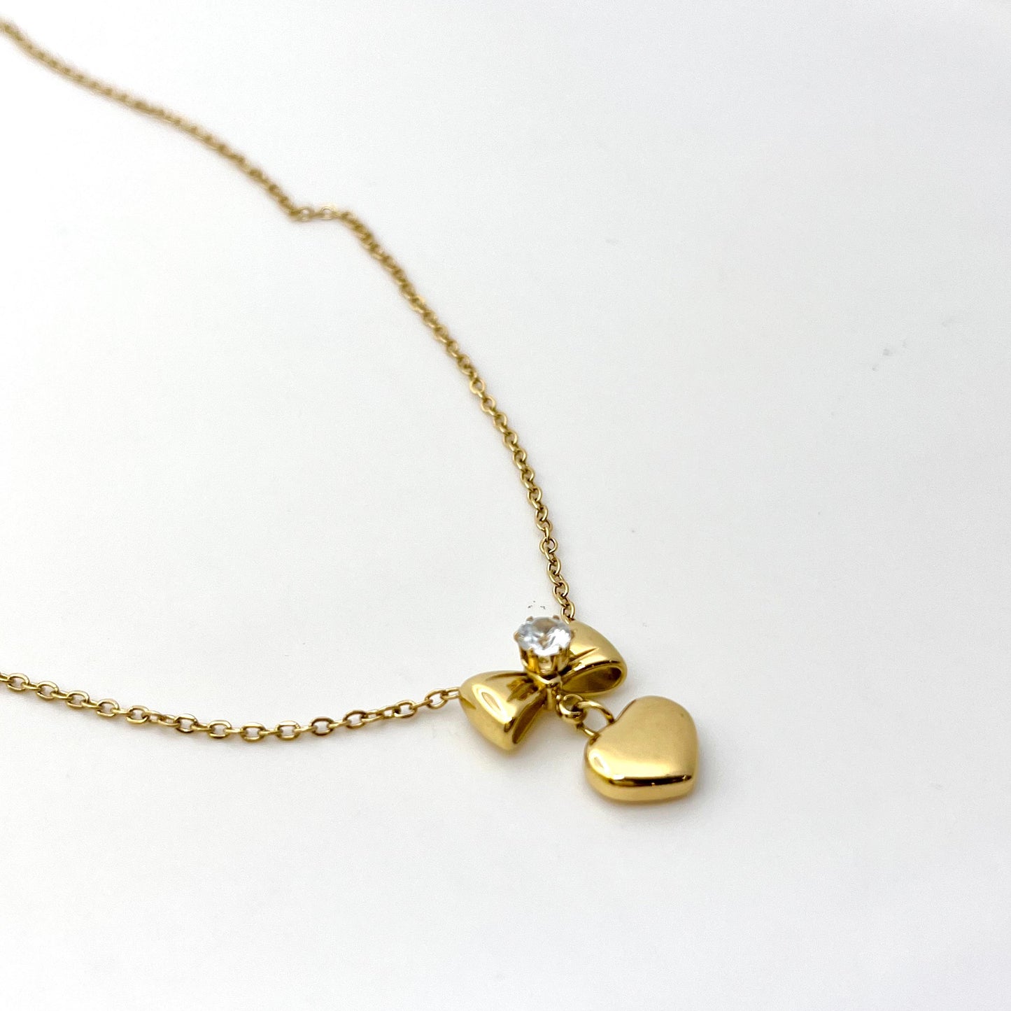 Bow and heart necklace