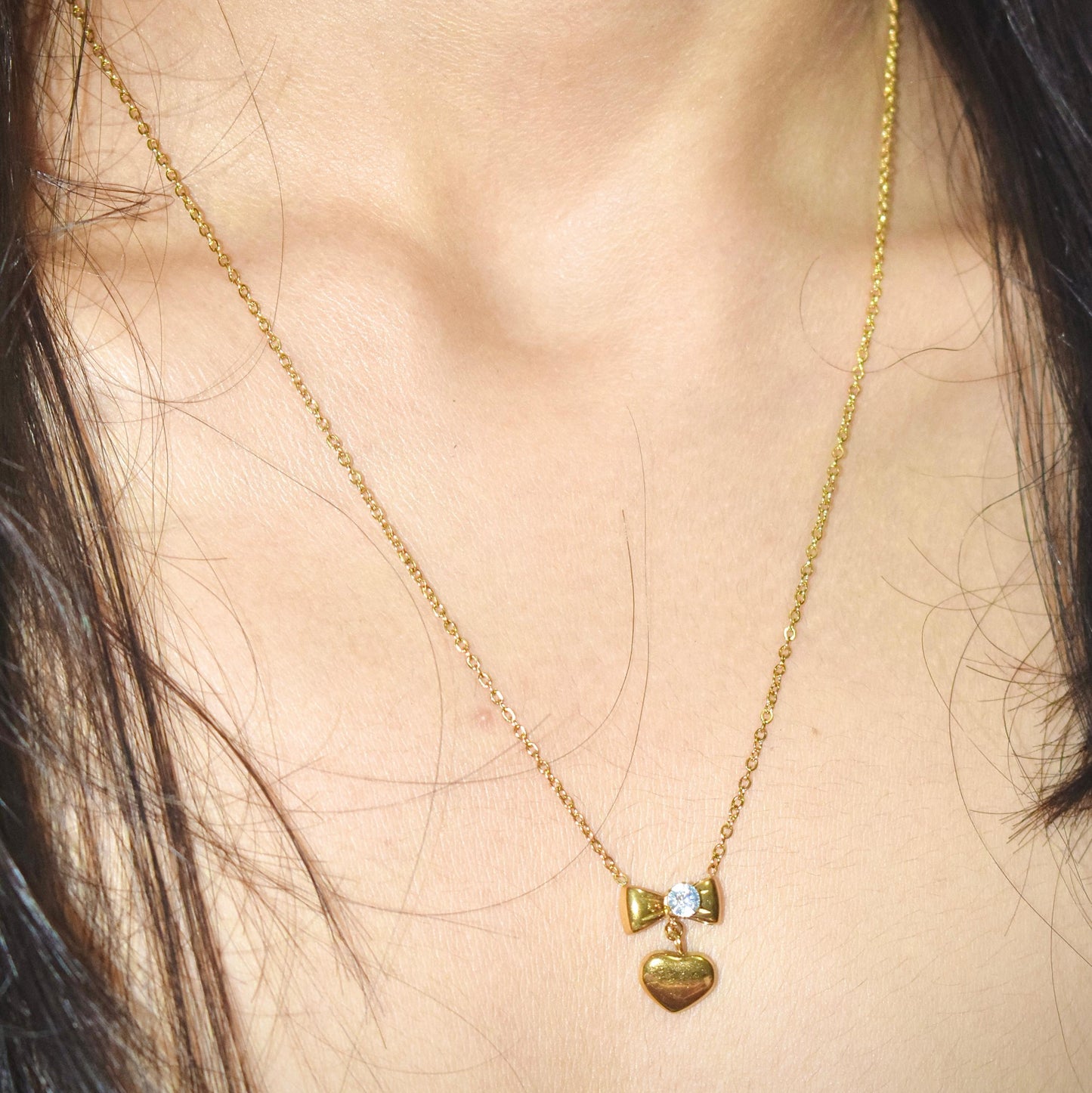 Bow and heart necklace