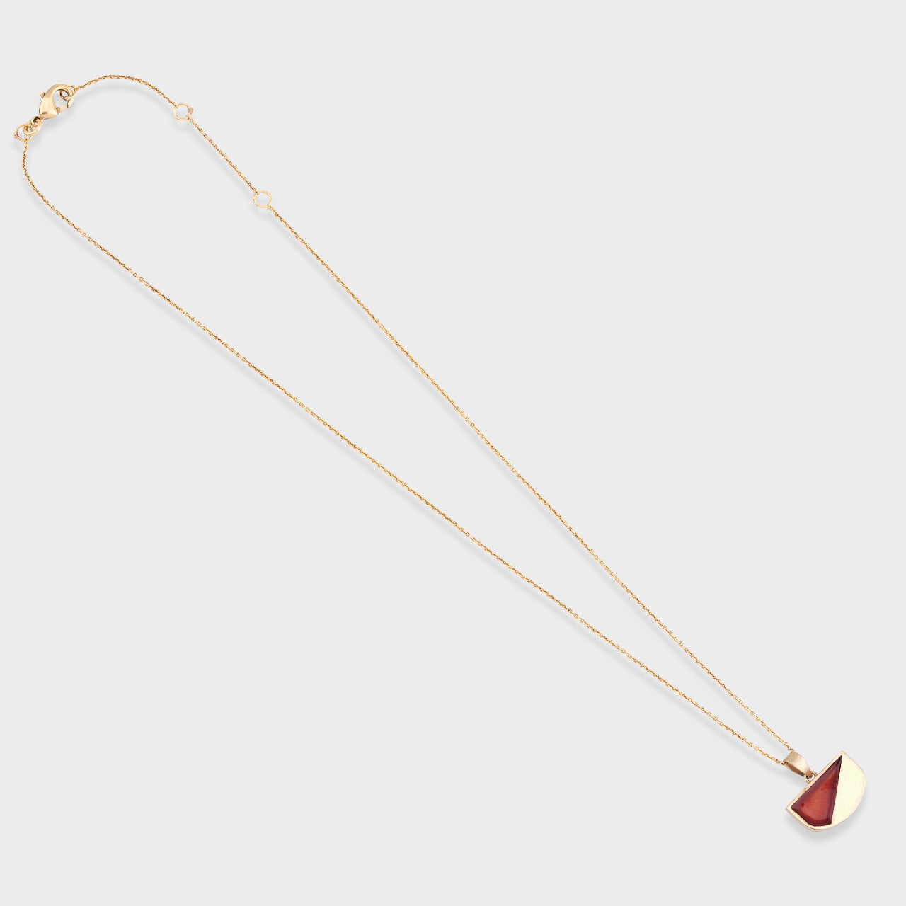 Ruby Strike Pendant - Gold Coated